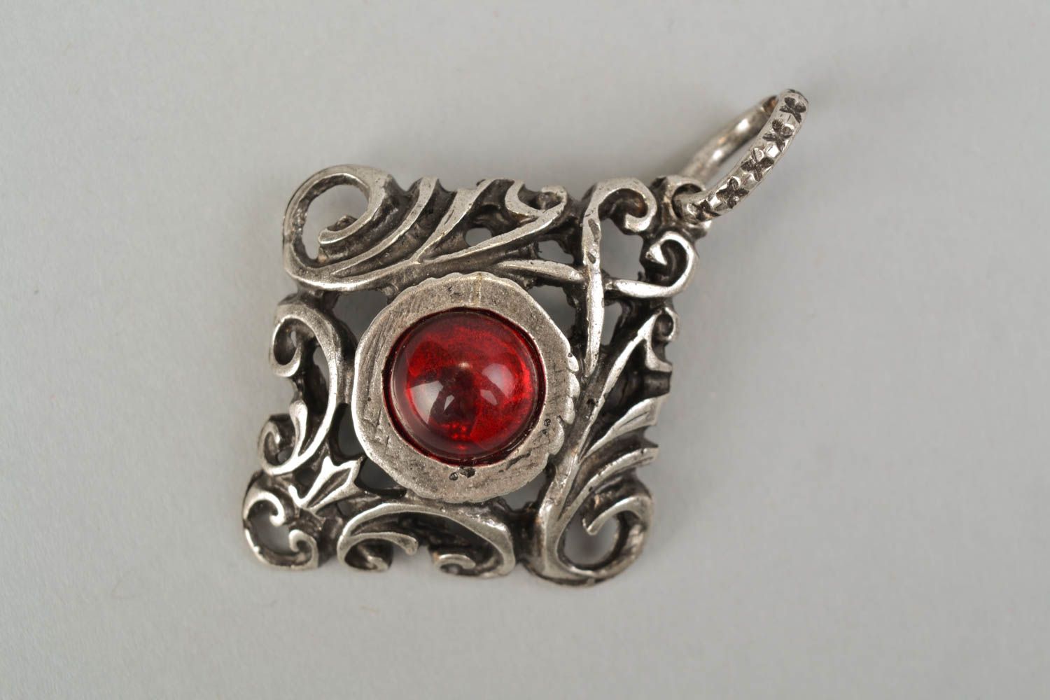 Metal pendant with red glass cabochon photo 3