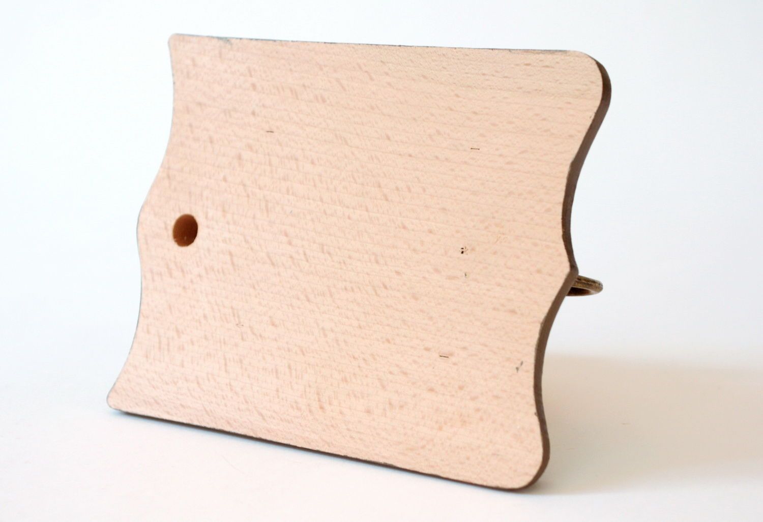 Colgador de paños tallado en madera foto 4