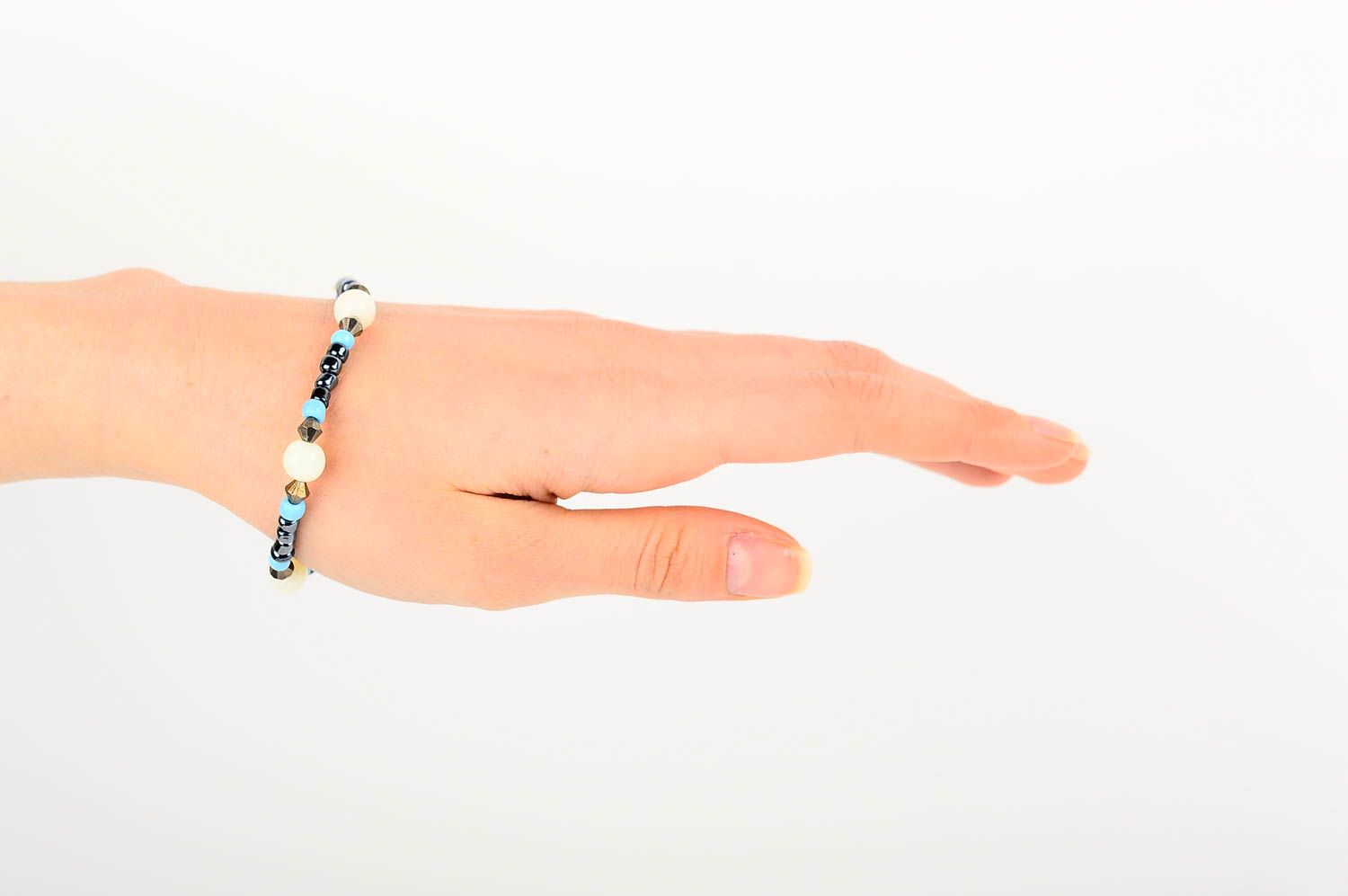 Elastic stretchy unisex bracelet made of black and blue beads  photo 2