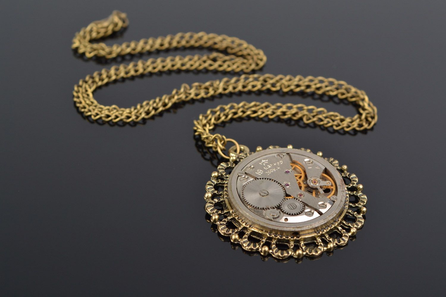 Handmade round metal pendant with clock details in steampunk style of long chain  photo 1