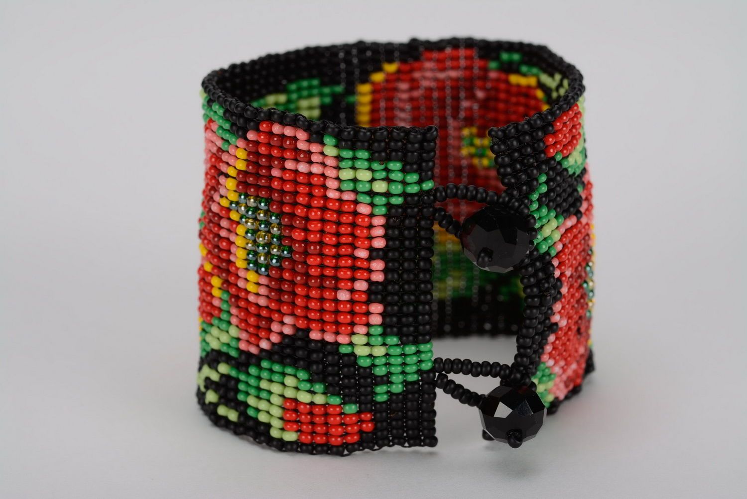 Bracelet avec fleurs rouges photo 3