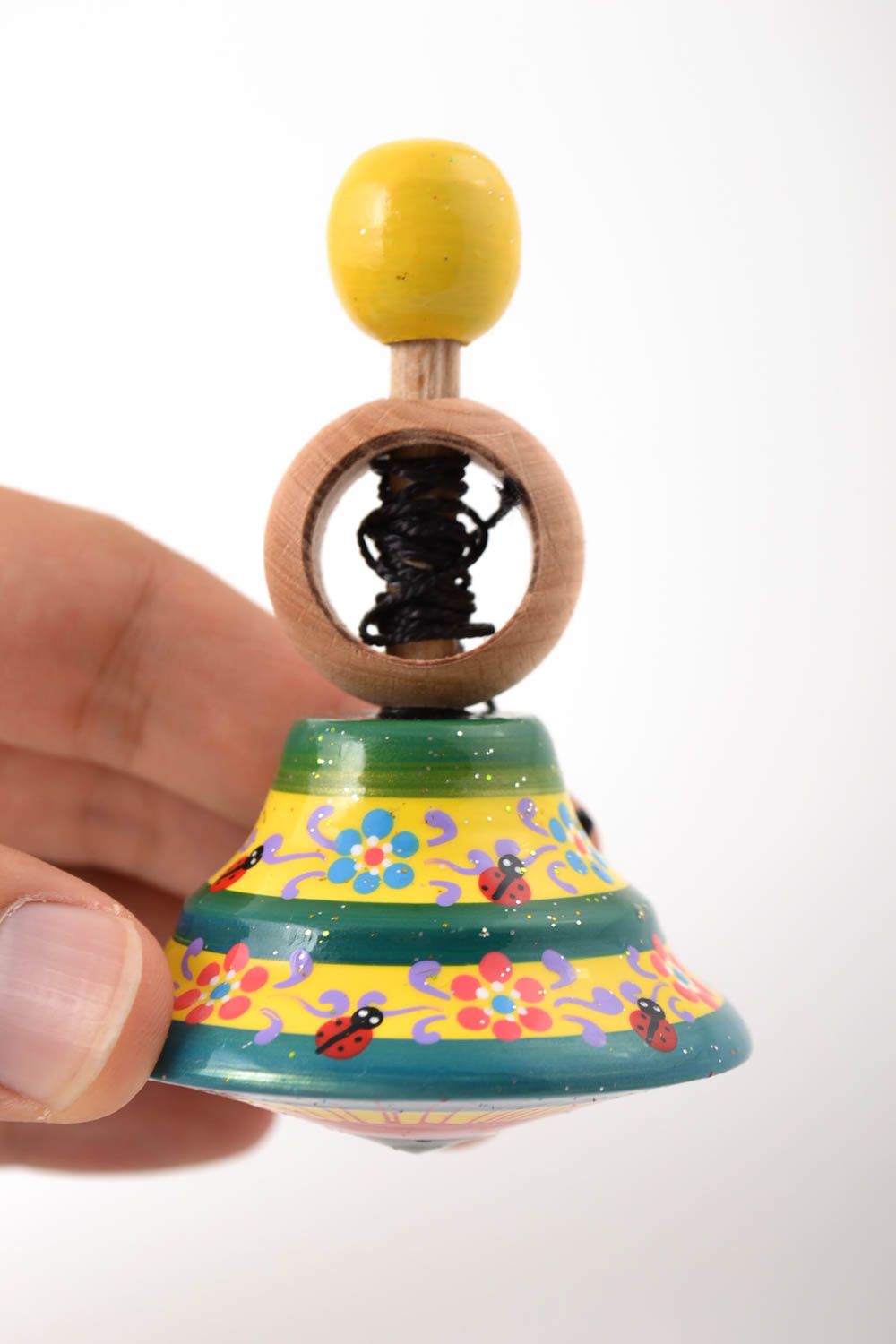 Peonza de madera hecha a mano juguete para niños con ornamentos regalo original foto 4