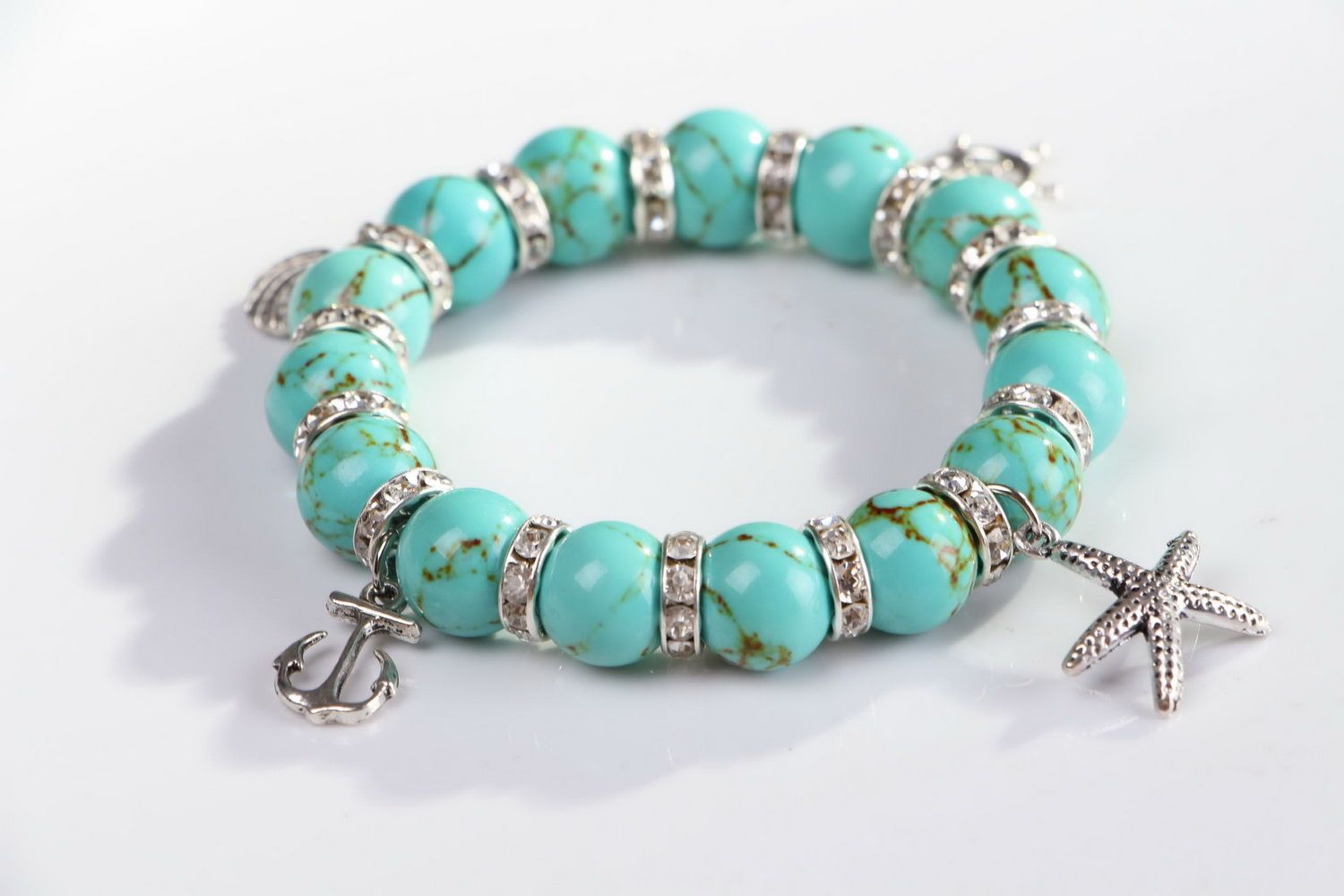 Bracelet with turquoise and pendants on elastic band photo 3