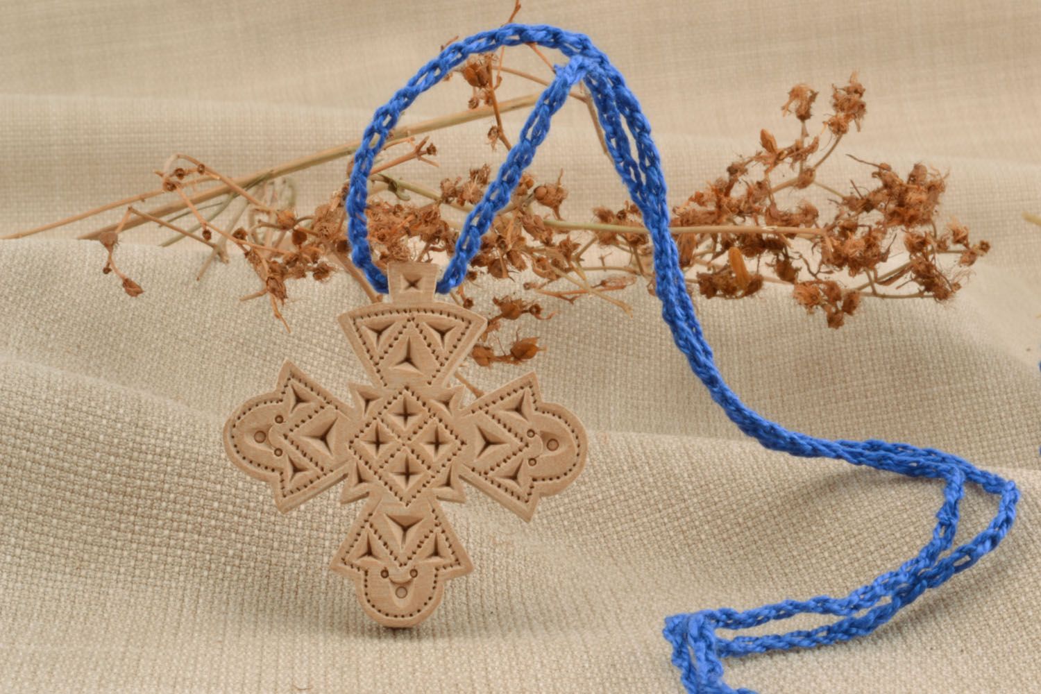 Wooden cross necklace with carving photo 1