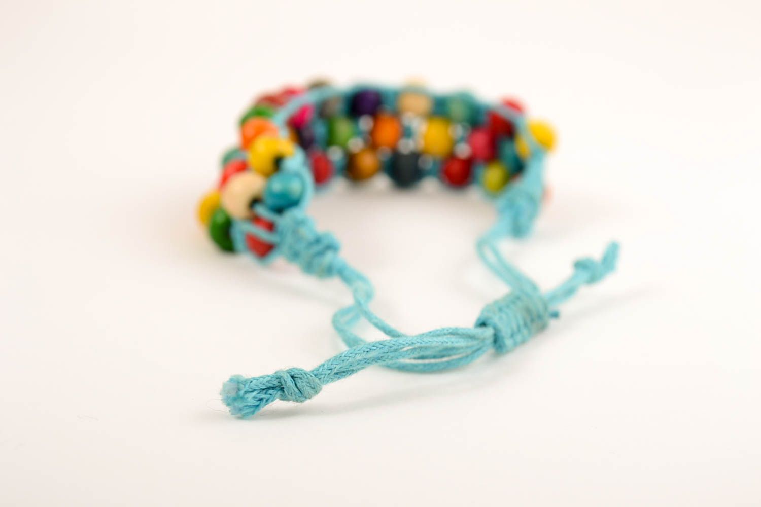 Bracelet multicolore Bijou fait main tressé en perles de bois Cadeau pour ado photo 3