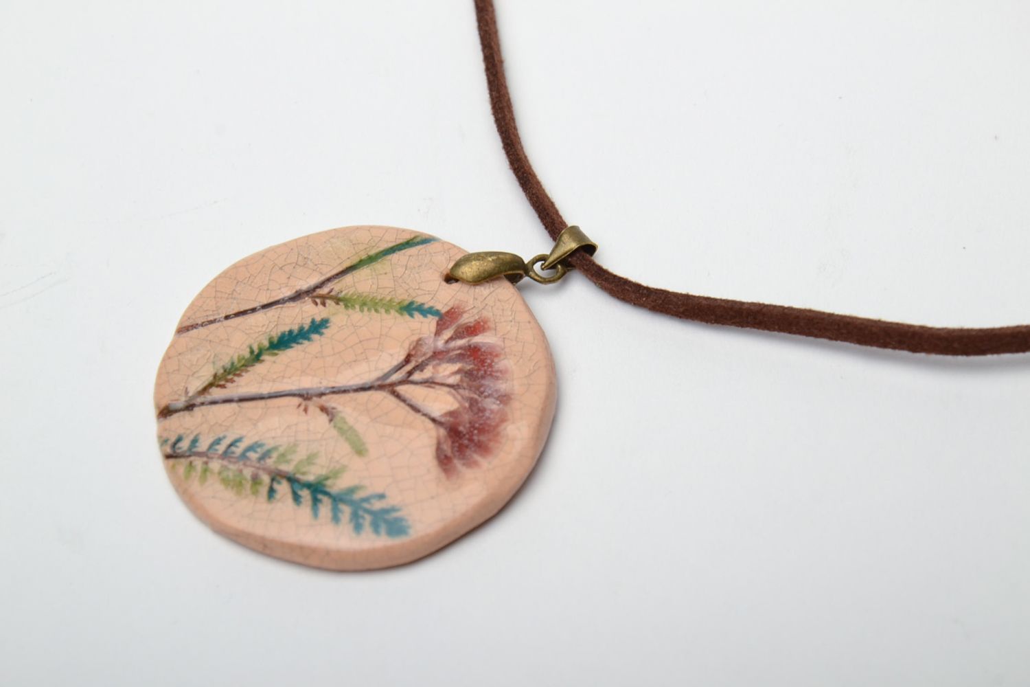 Ceramic pendant with stamps of plants  photo 3