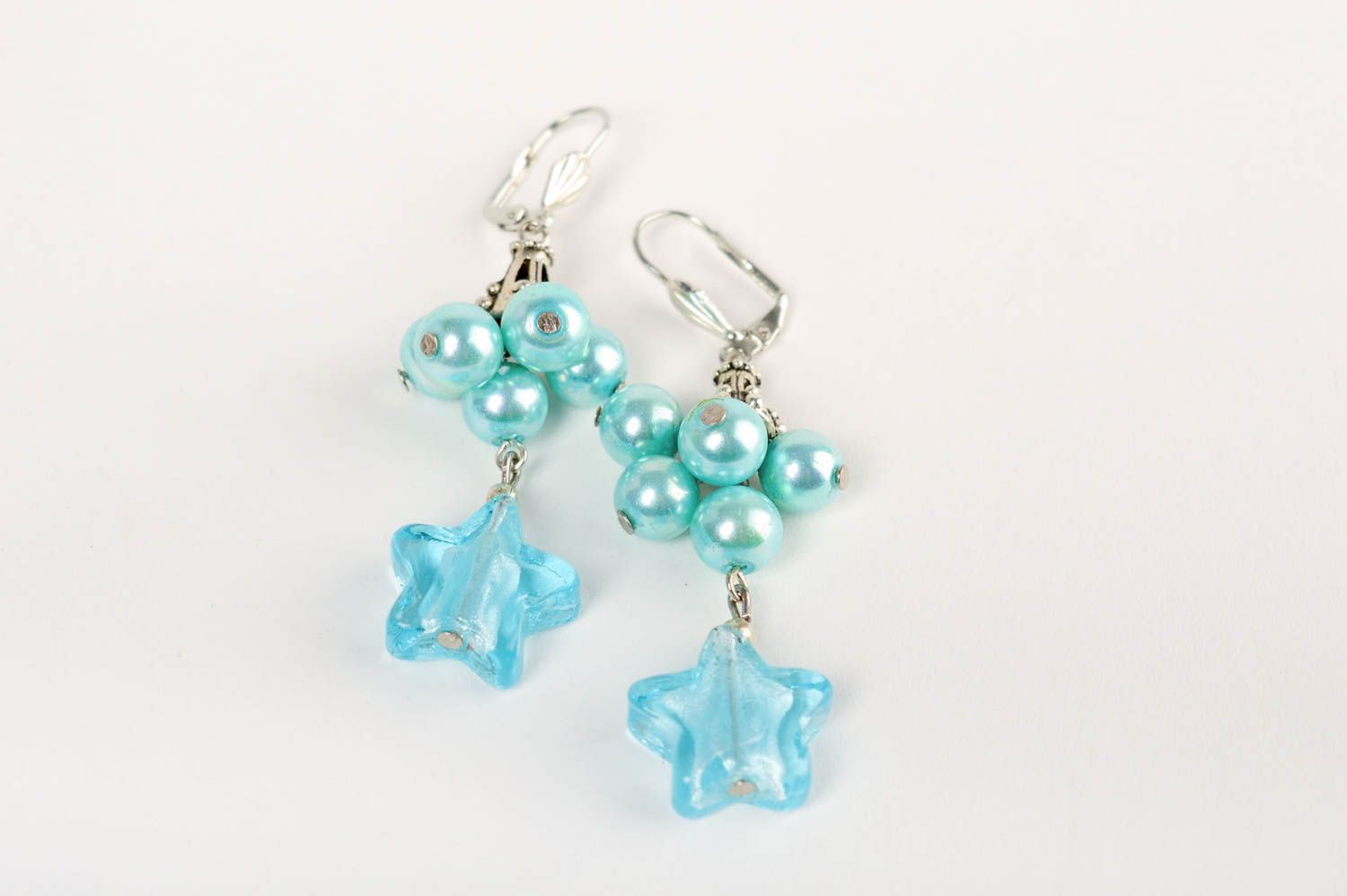 Pendientes de cuentas de vidrio y perlas de cerámica artesanales azules estrella foto 1
