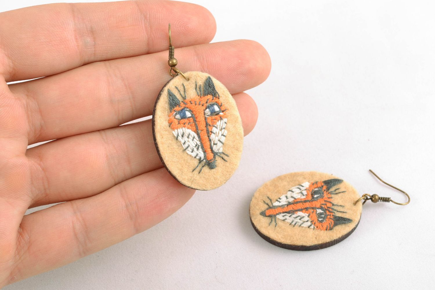 Unusual oval earrings with embroidery photo 2