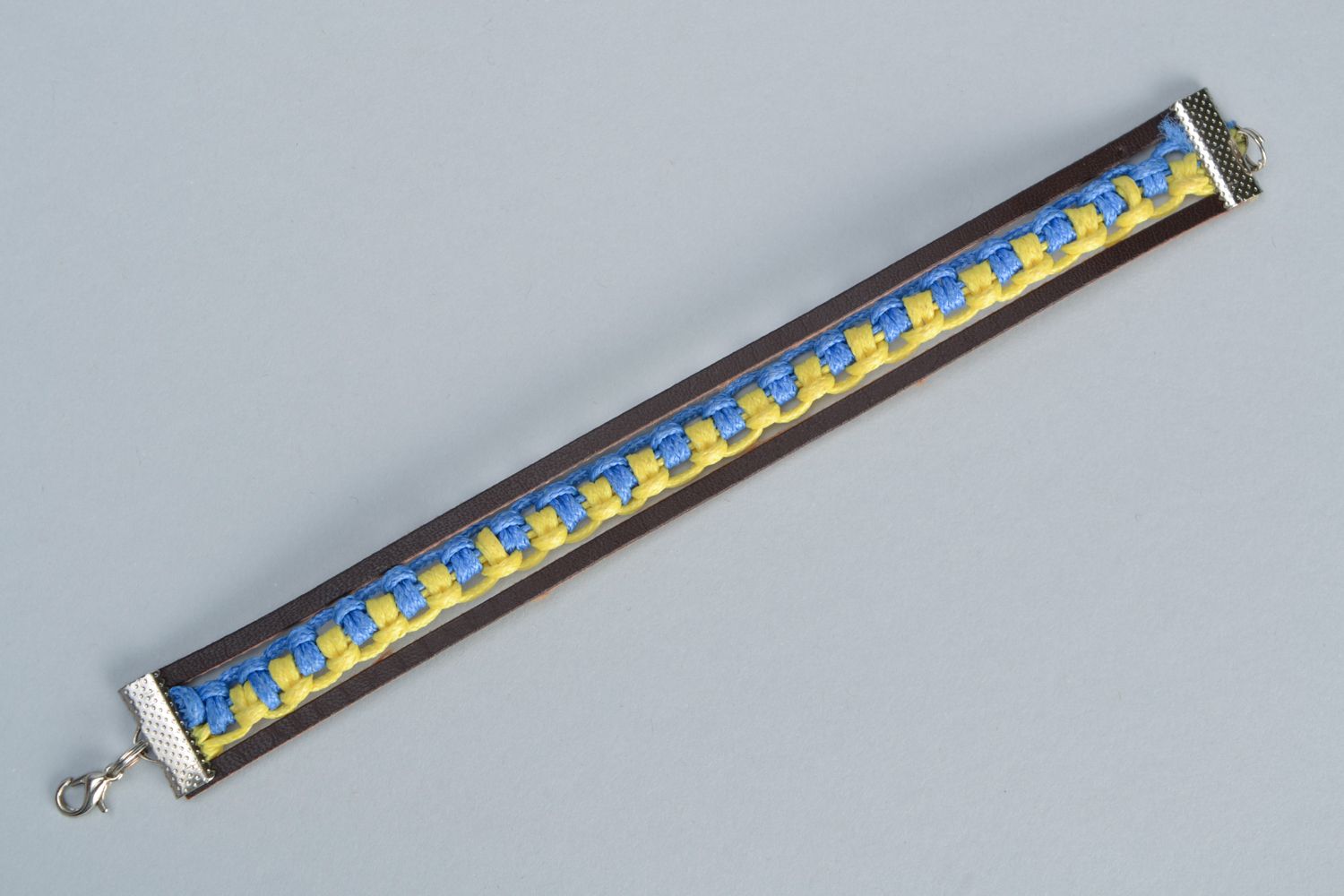 Yellow and blue bracelet with leather and waxed cord photo 5