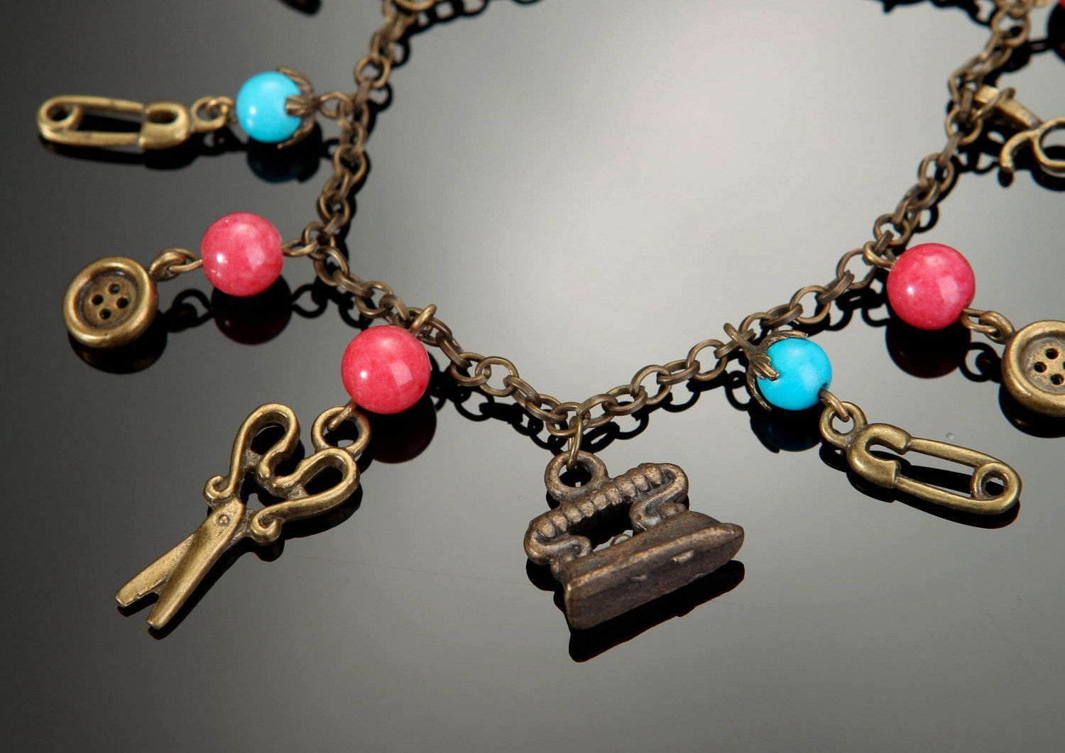 Bronze bracelet with coral and turquoise photo 2