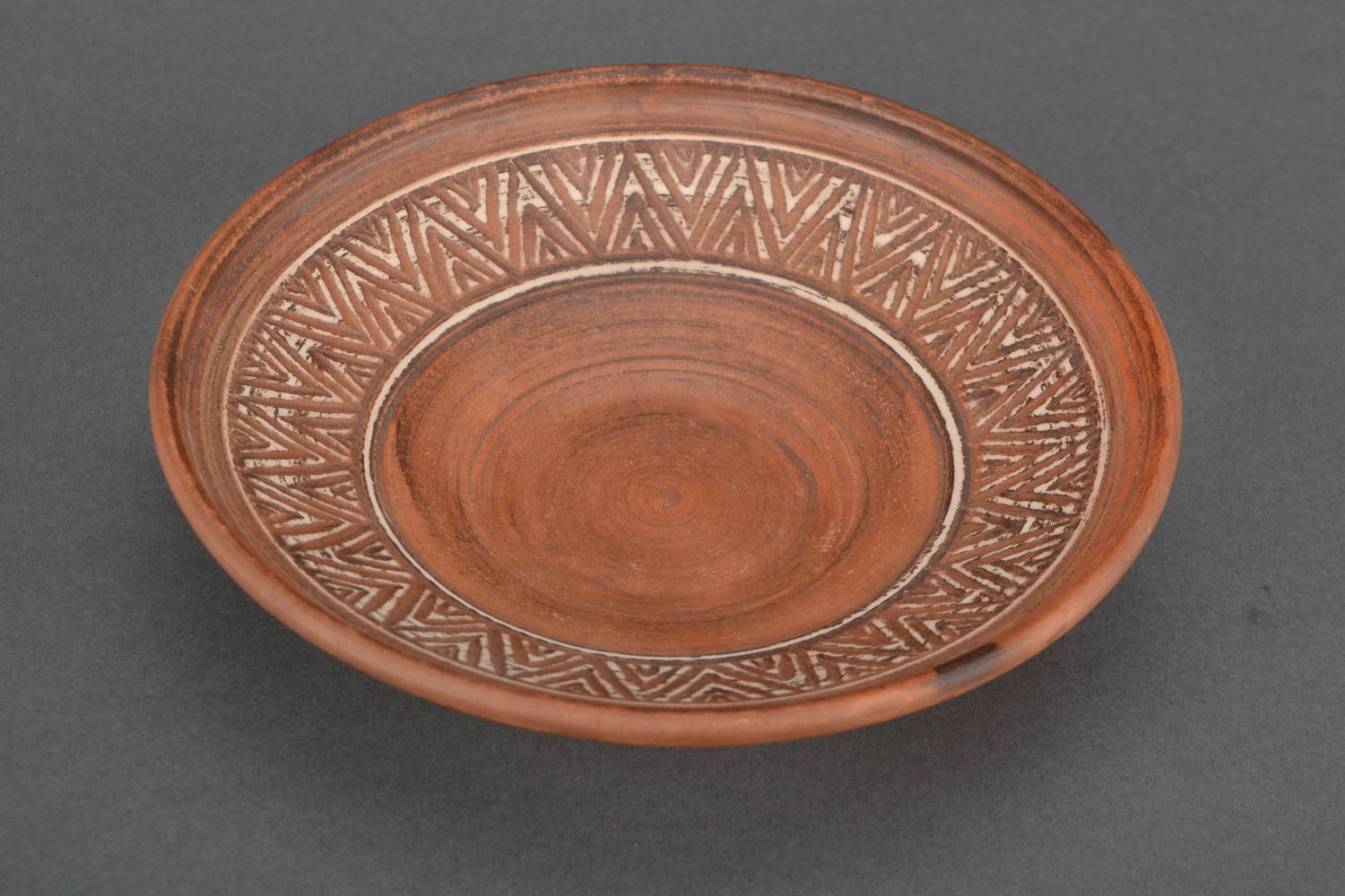 Handmade ceramic plate kilned with milk photo 1