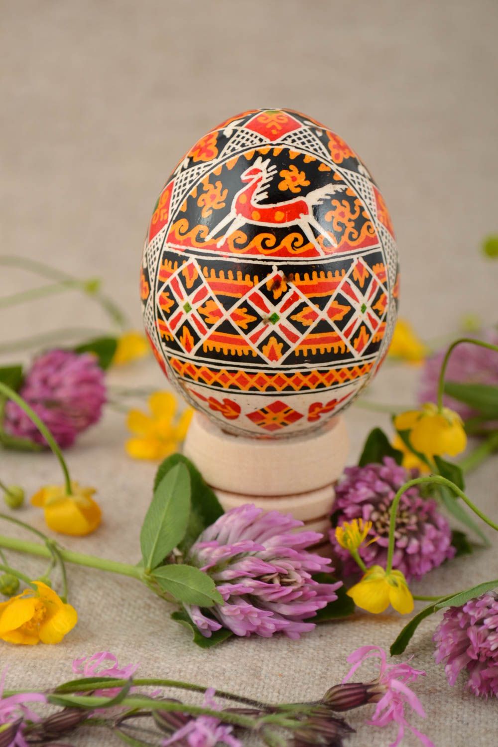 Beautiful handmade painted Easter egg with colorful ornament photo 1