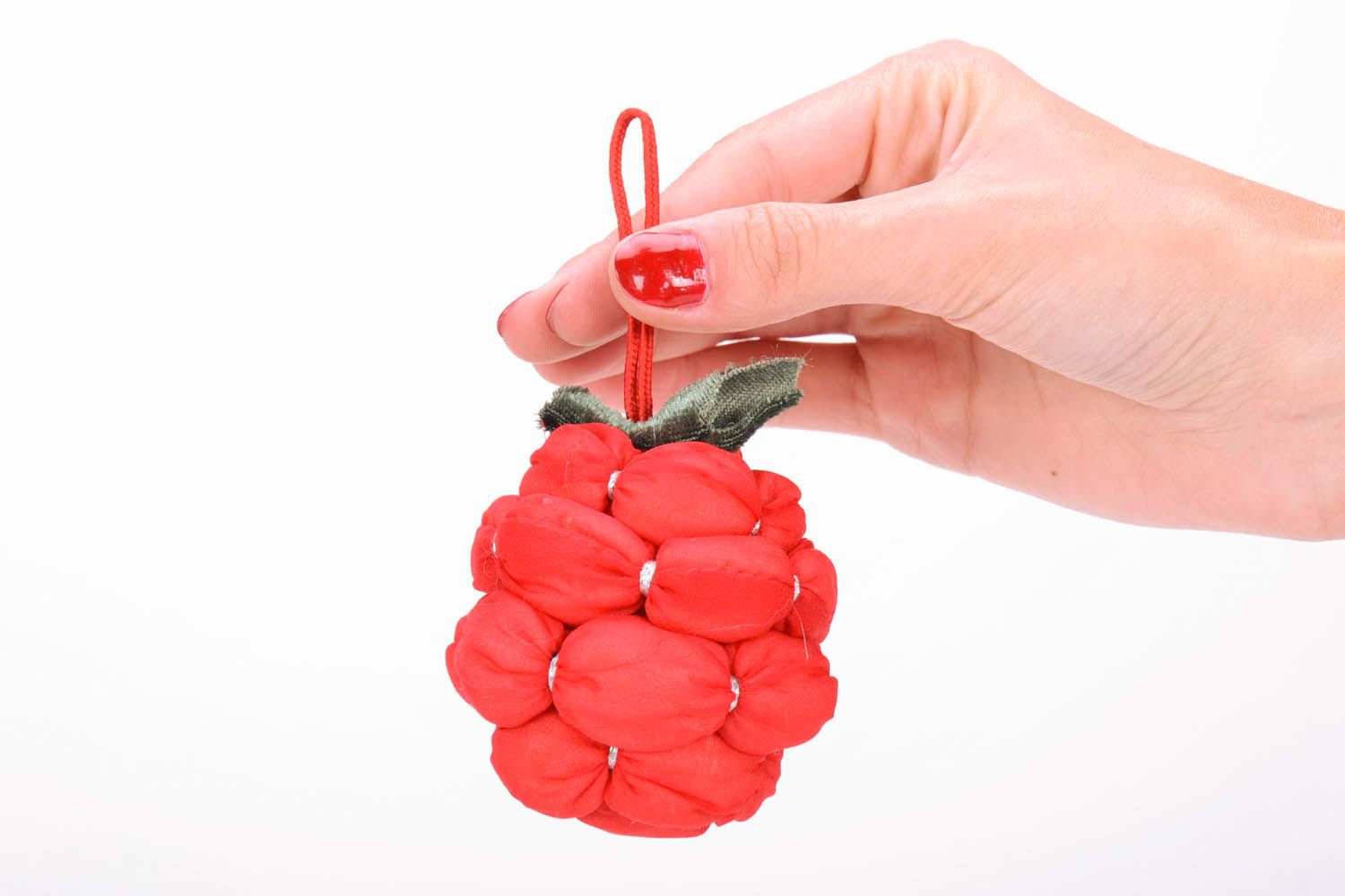 Brinquedo de Natal feito de plástico na forma de uma baga macia brilhante foto 5