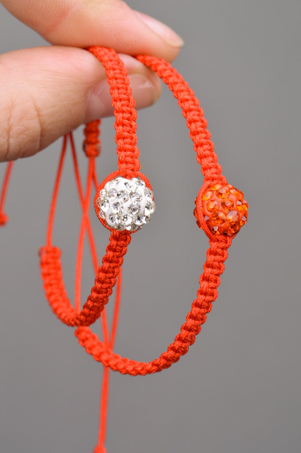 Set of 2 handmade orange friendship wrist bracelets woven of threads with beads  photo 3