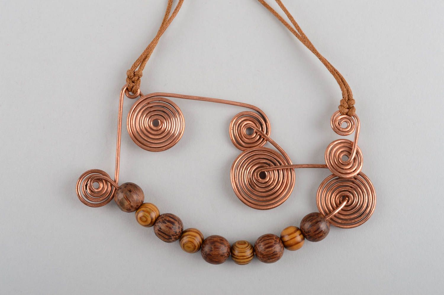Beautiful women's handmade design pendant with wooden beads and copper elements photo 3