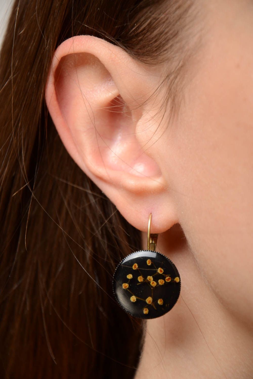 Beautiful nice unusual handmade round epoxy resin earrings with dried flowers   photo 2