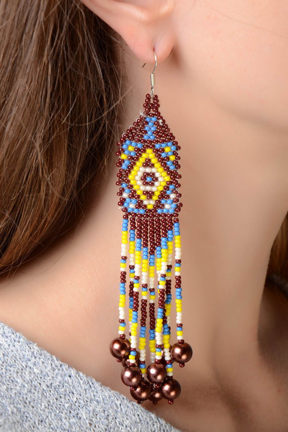 Beautiful handmade designer long earrings with beaded fringe and ethnic ornament photo 1