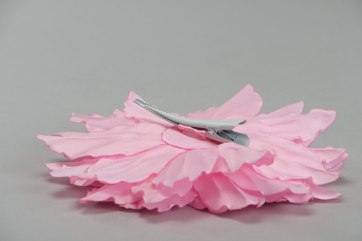 Large handmade hair clip made of satin fabric in the shape of pink flower photo 3