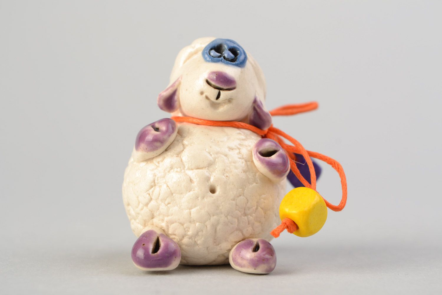 Handmade funny decorative ceramic figurine of cute lamb painted with glaze photo 1
