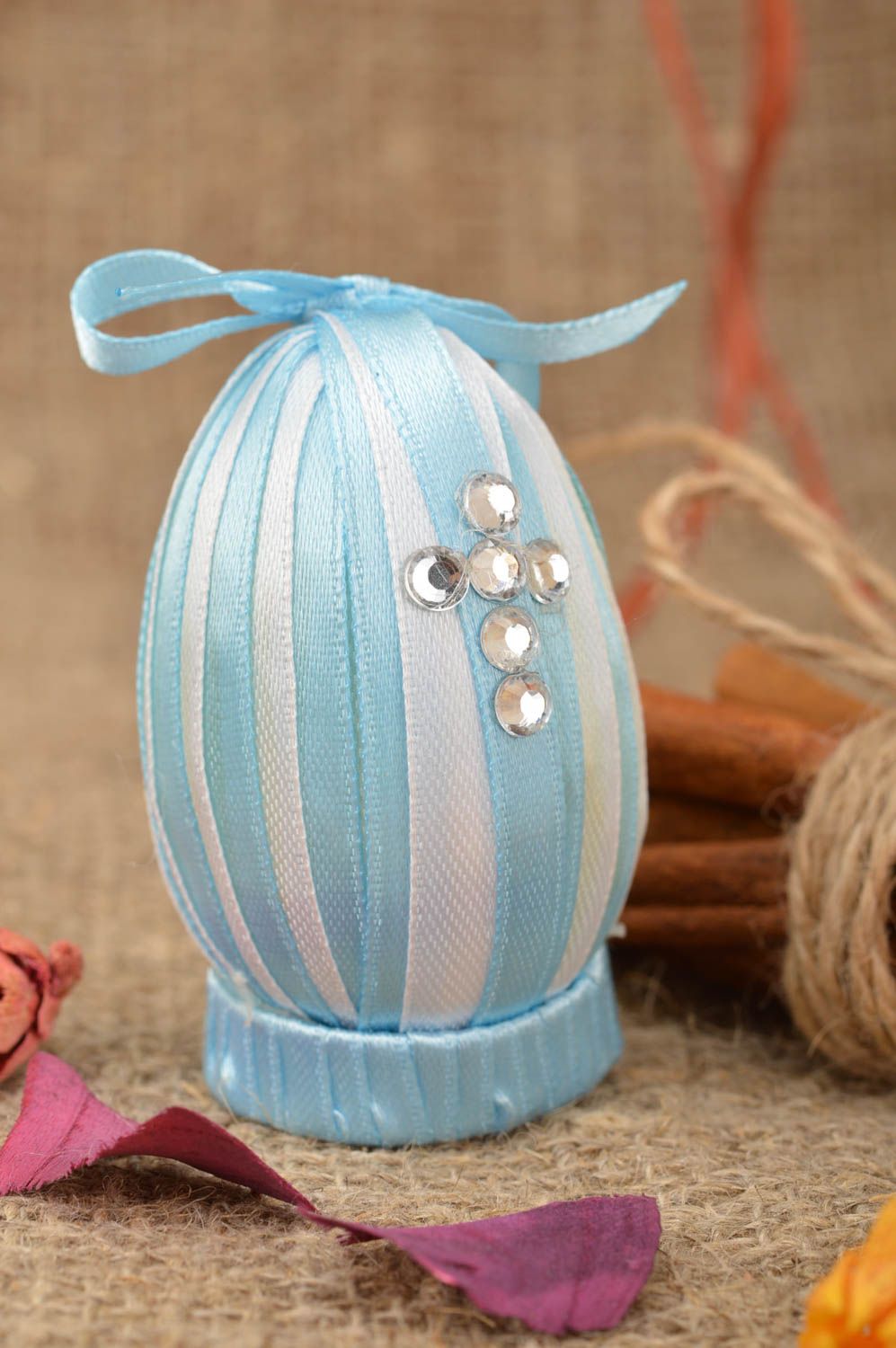 Handmade cute blue plastic Easter egg decorated with ribbons and strasses photo 1