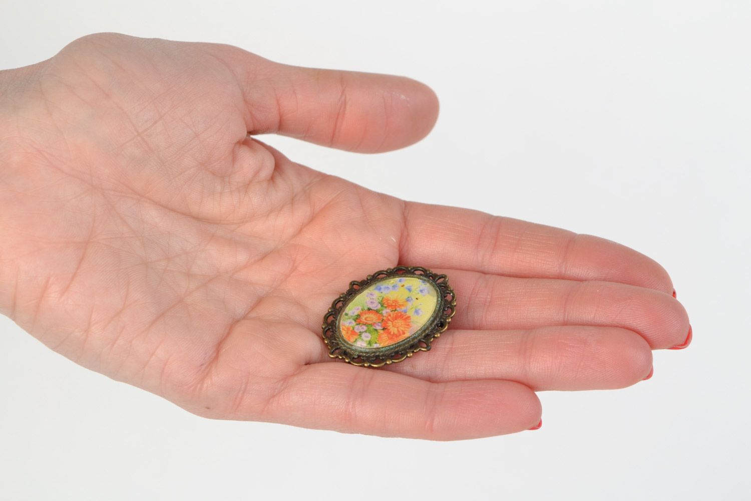 Handmade colorful vintage brooch with floral print coated with epoxy resin  photo 2