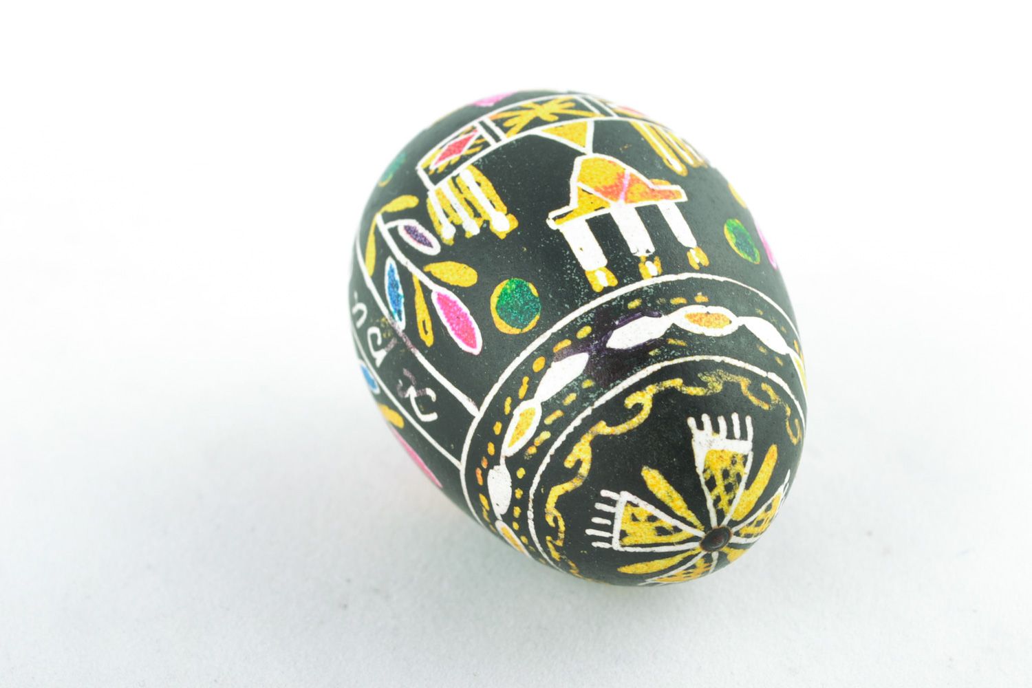 Handmade decorative egg with symbolic ornament painted using wax technique  photo 3