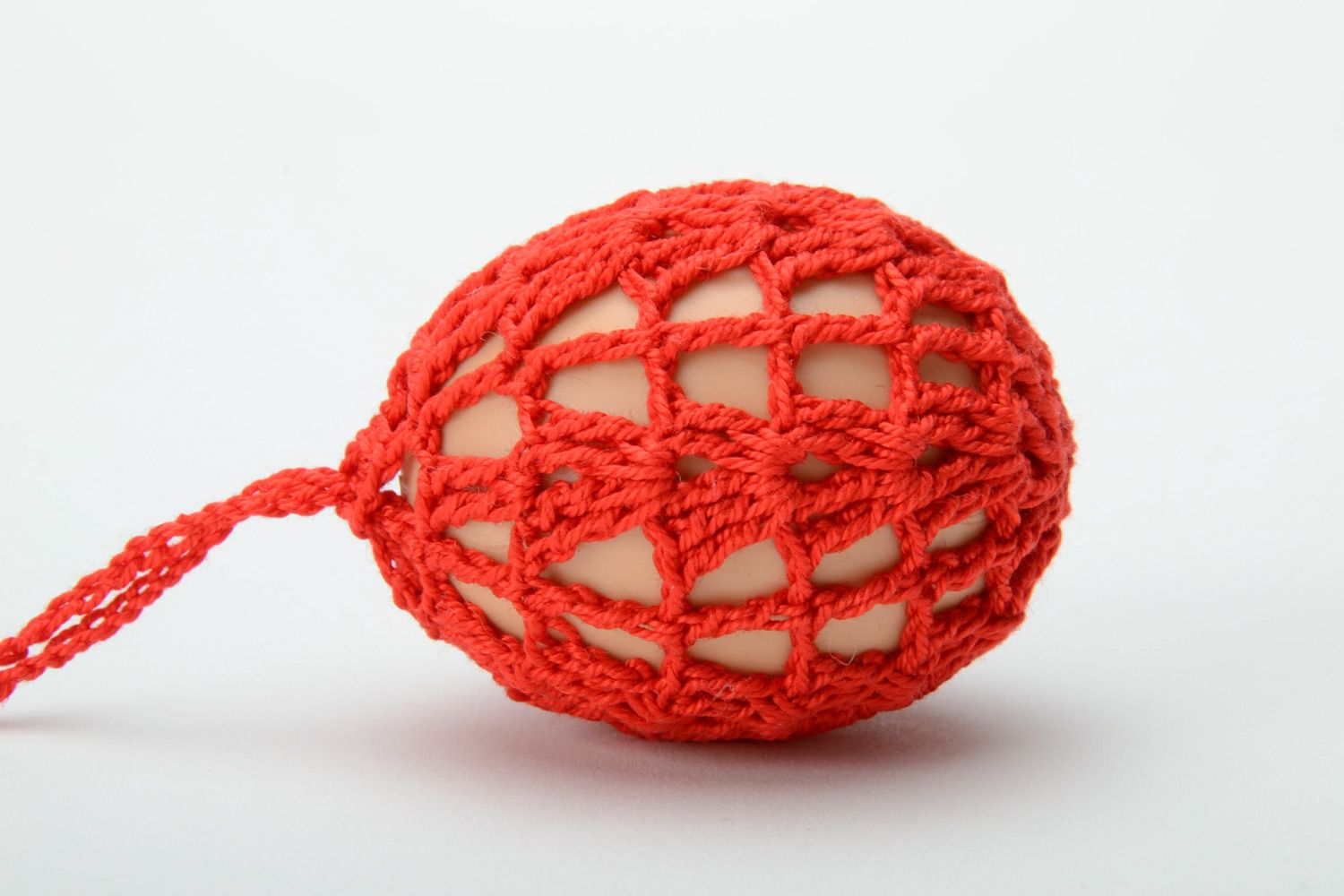 Homemade red decorative Easter egg woven over with threads photo 4