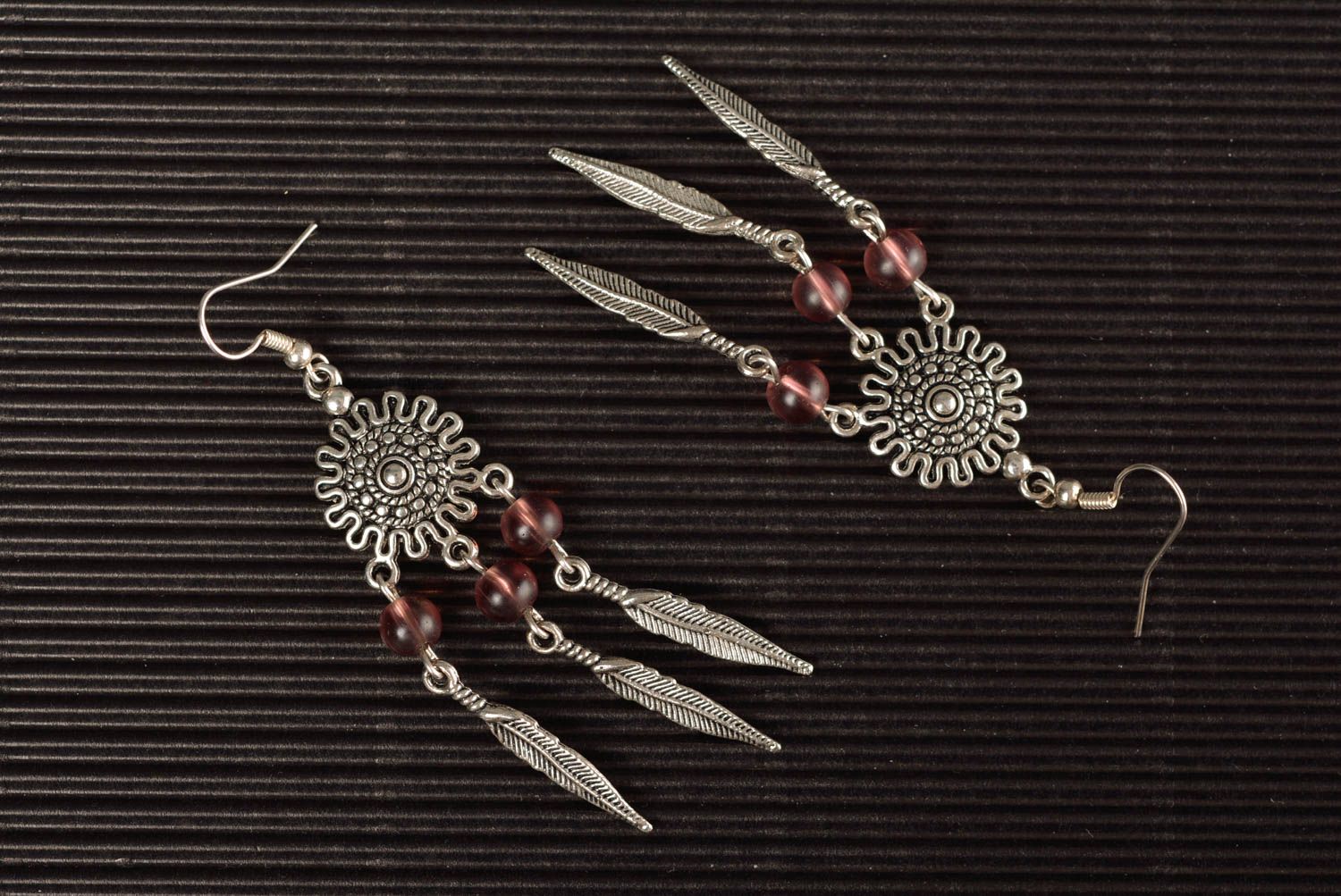 Handmade massive ethnic metal dangle earrings with small glass beads photo 1