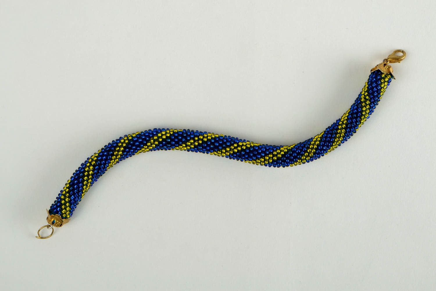 Beaded cord bracelet in dark blue and yellow beads for young girls photo 2