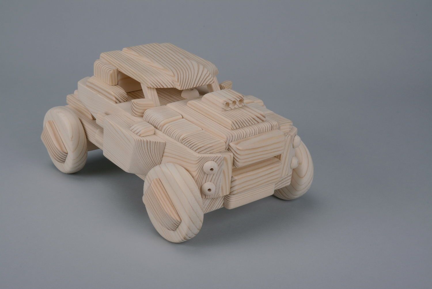Spielzeug Auto aus Holz foto 1