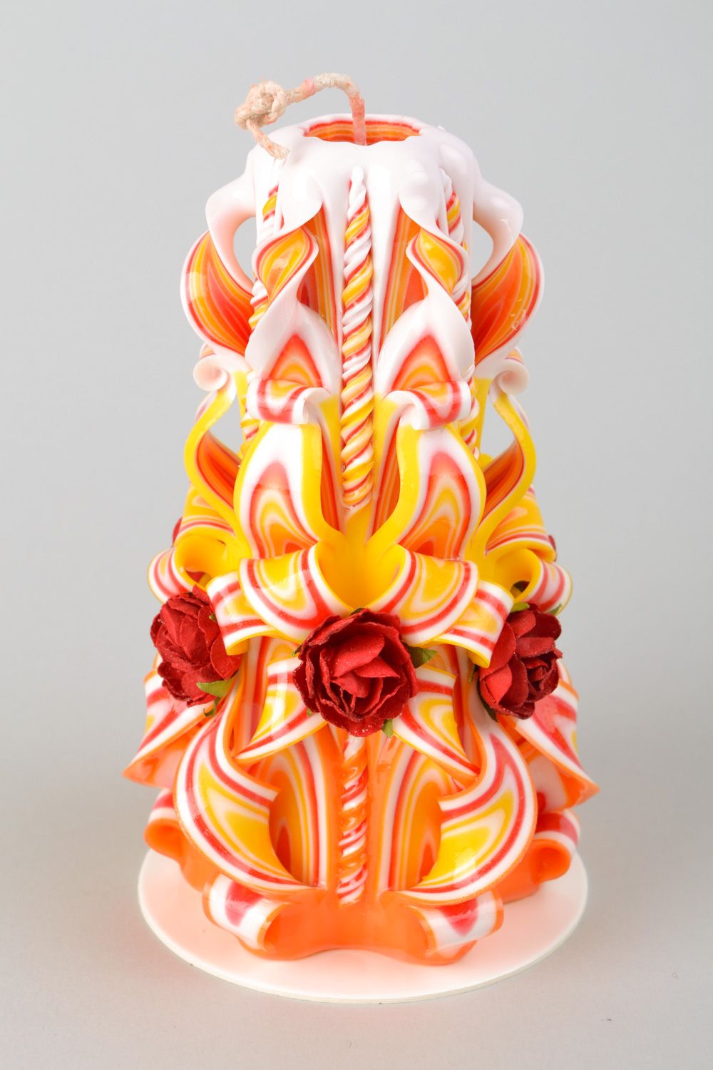 Handgemachte vielfarbige große Kerze aus Paraffin mit Rosen für Haus Dekoration  foto 4