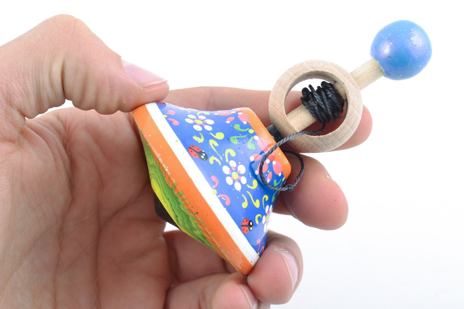 Развивающая игрушка юла голубая маленькая расписная деревянная ручной работы фото 2