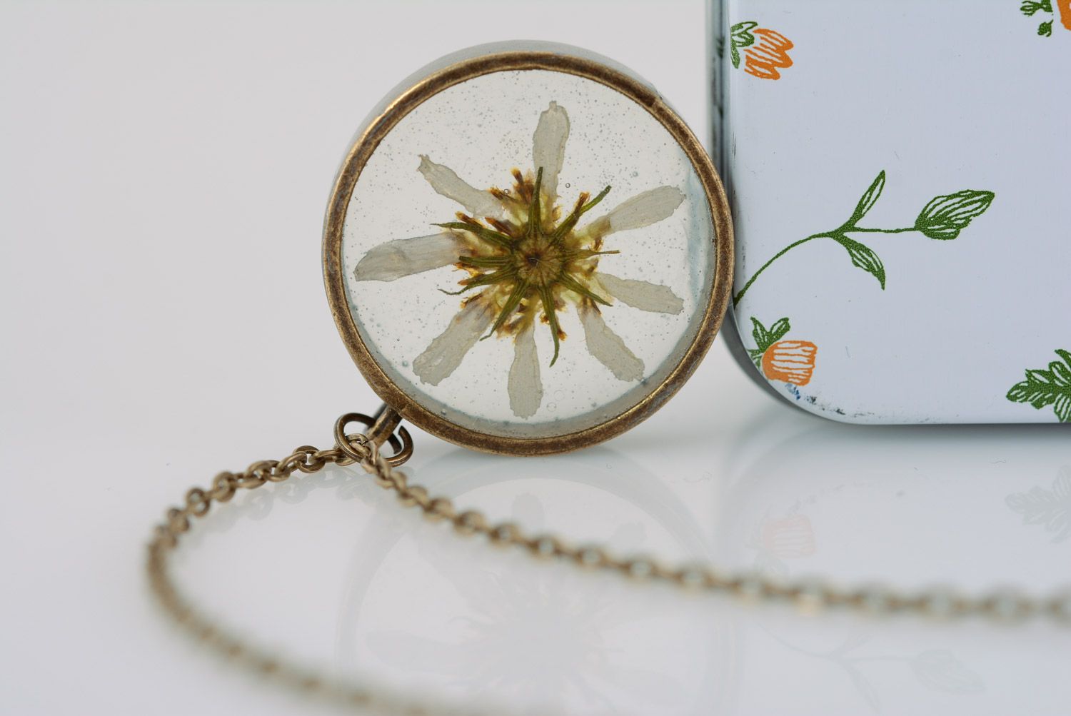 Handmade round transparent pendant with chamomile in epoxy resin on chain photo 1