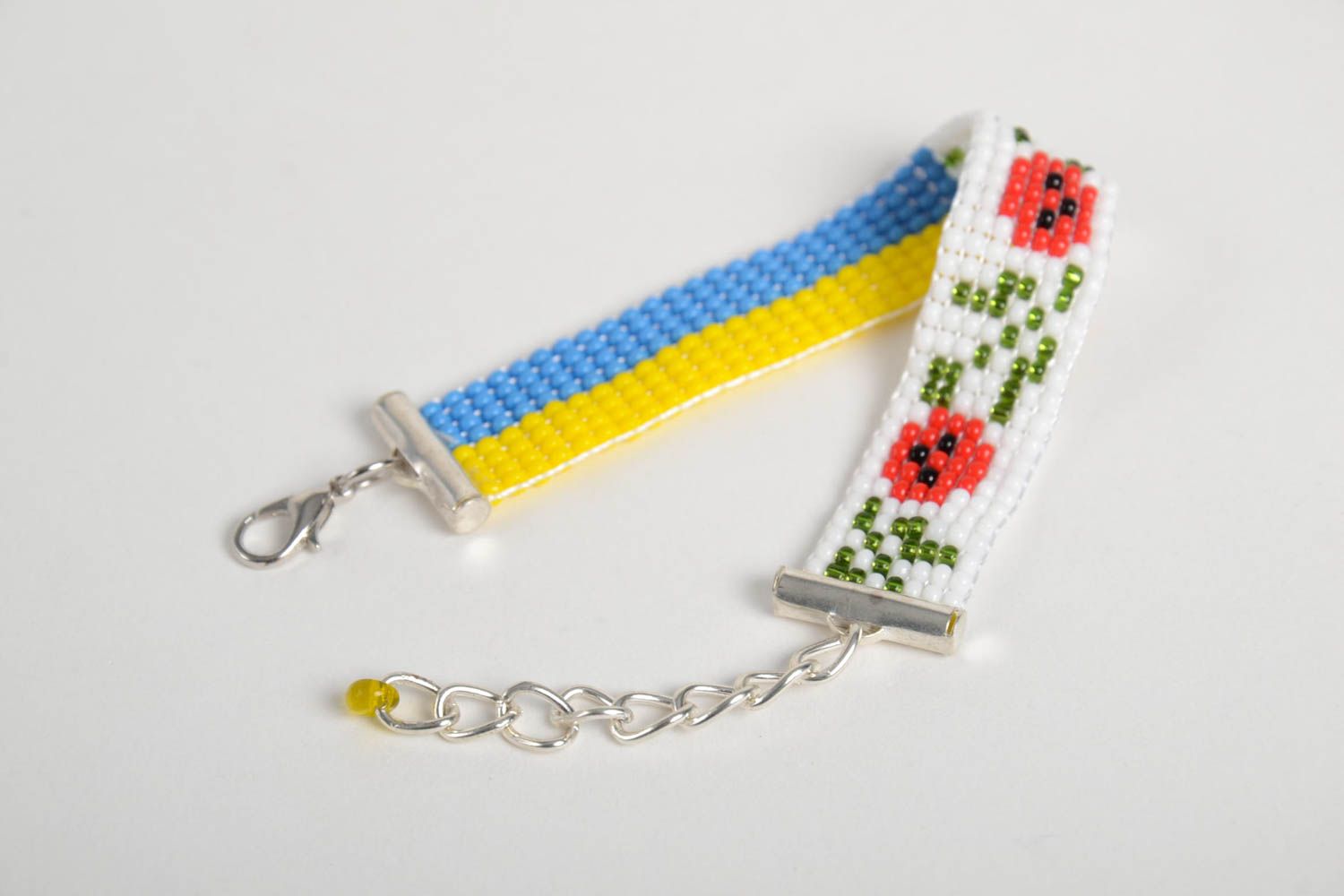 Bright beaded bracelet with the Ukrainian flag and floral ornament photo 4