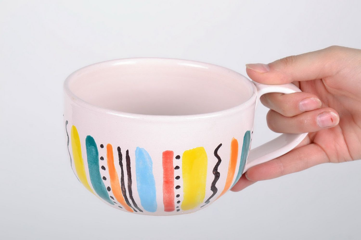 White glazed ceramic cup with handle in a color stripe pattern photo 5