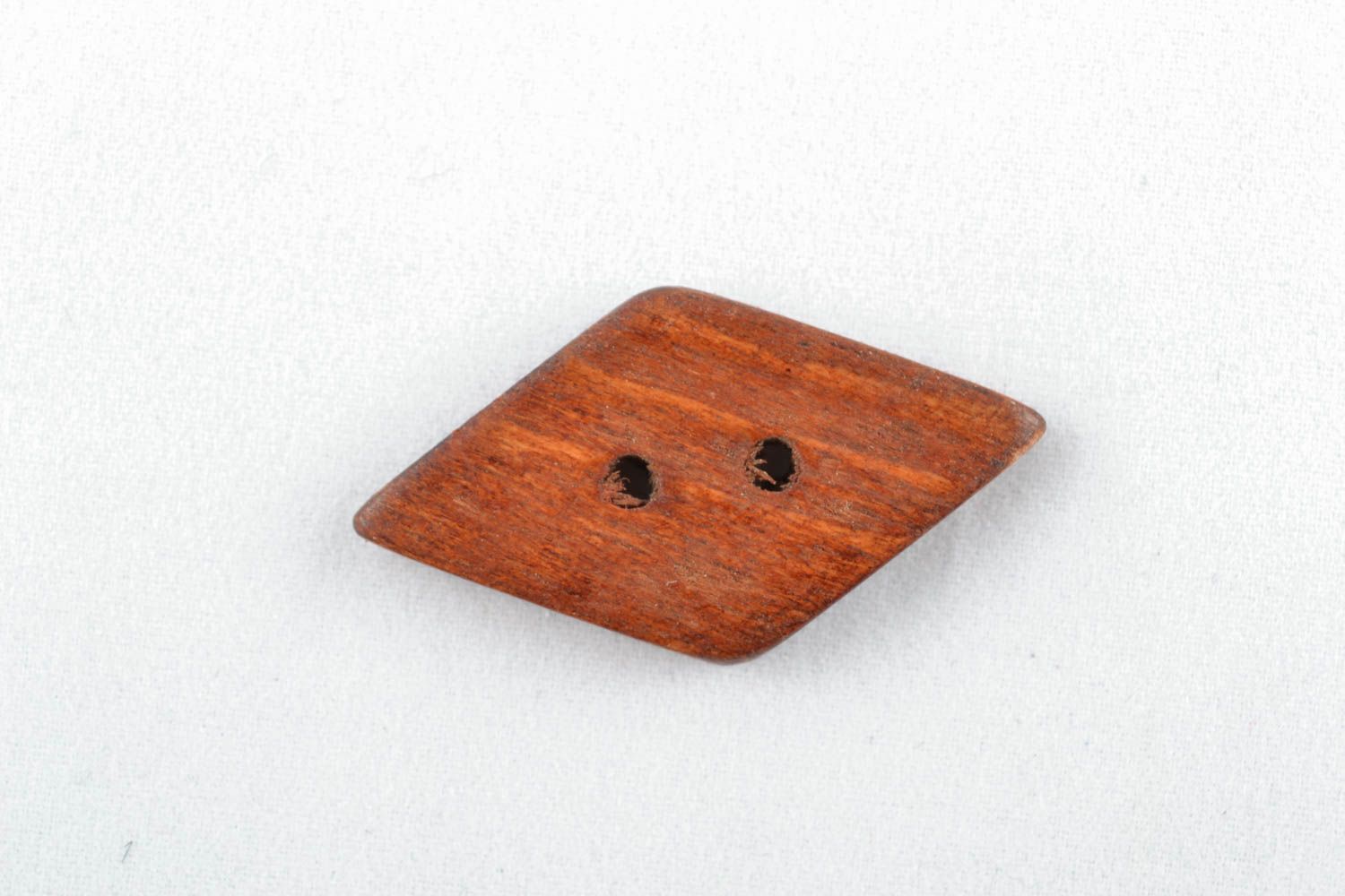 Figürliche Knöpfe aus Holz foto 3