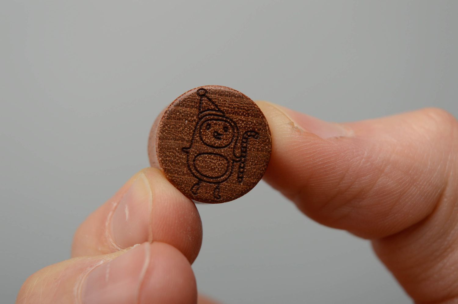 Sapele wood plug earrings with images of penguin and Father Frost photo 2