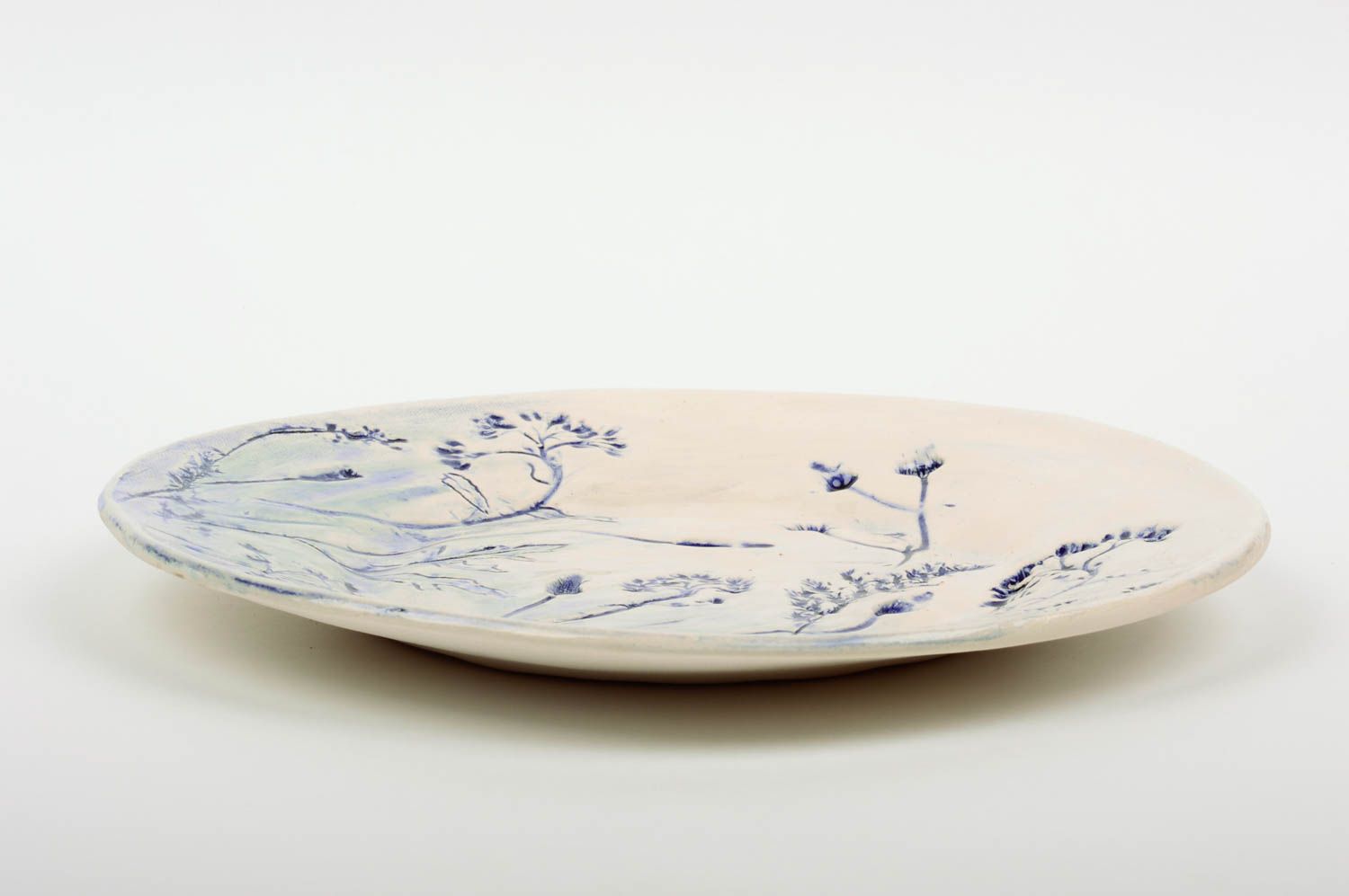 Assiette en céramique décorative faite main peinte de glaçure à motif bleu blanc photo 2