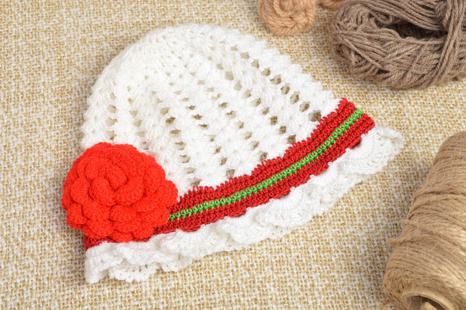 Openwork crocheted cap handmade stylish accessory for kids white cap with flower photo 1