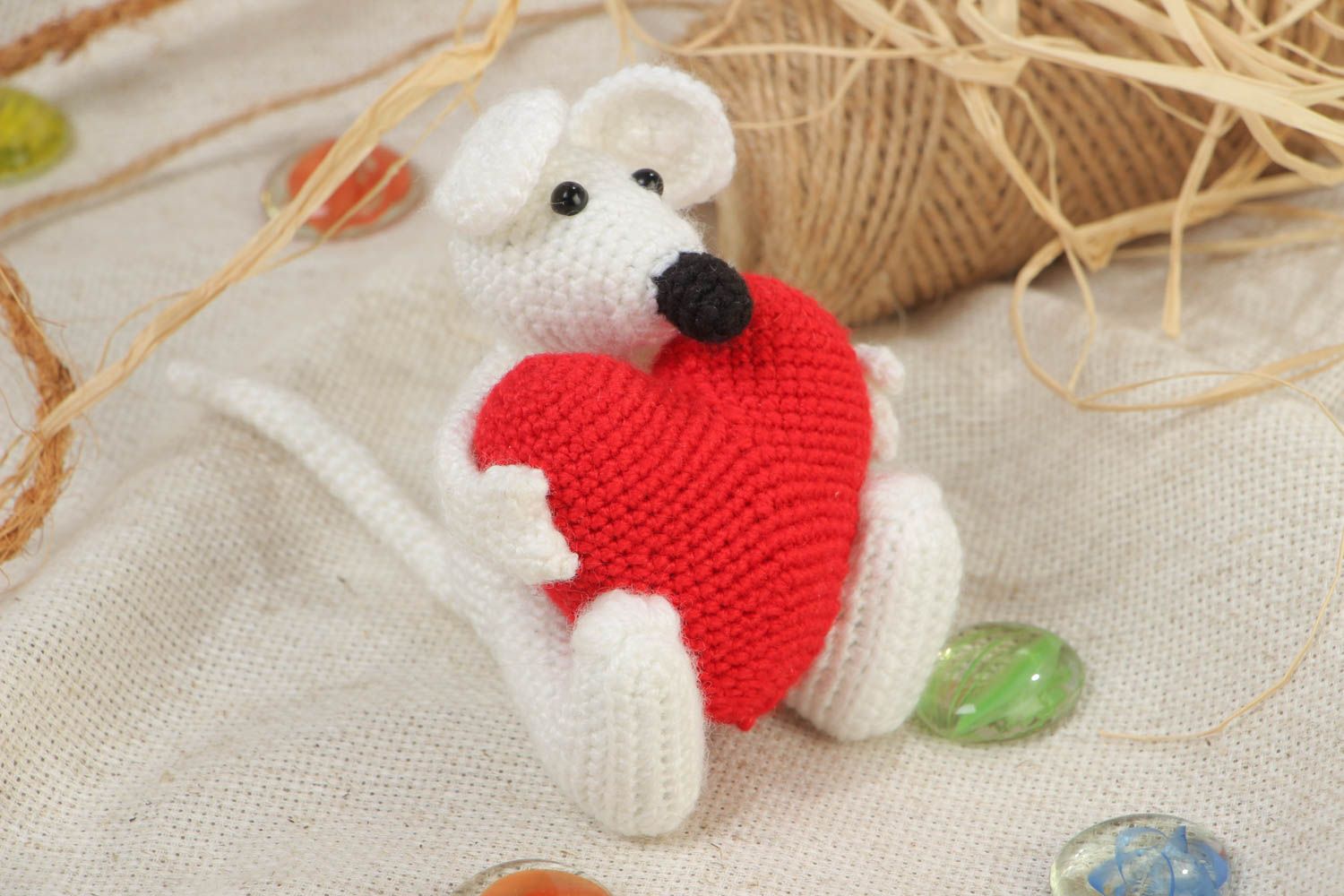 Handmade soft toy crocheted of acrylics in the shape of white mouse with heart photo 1