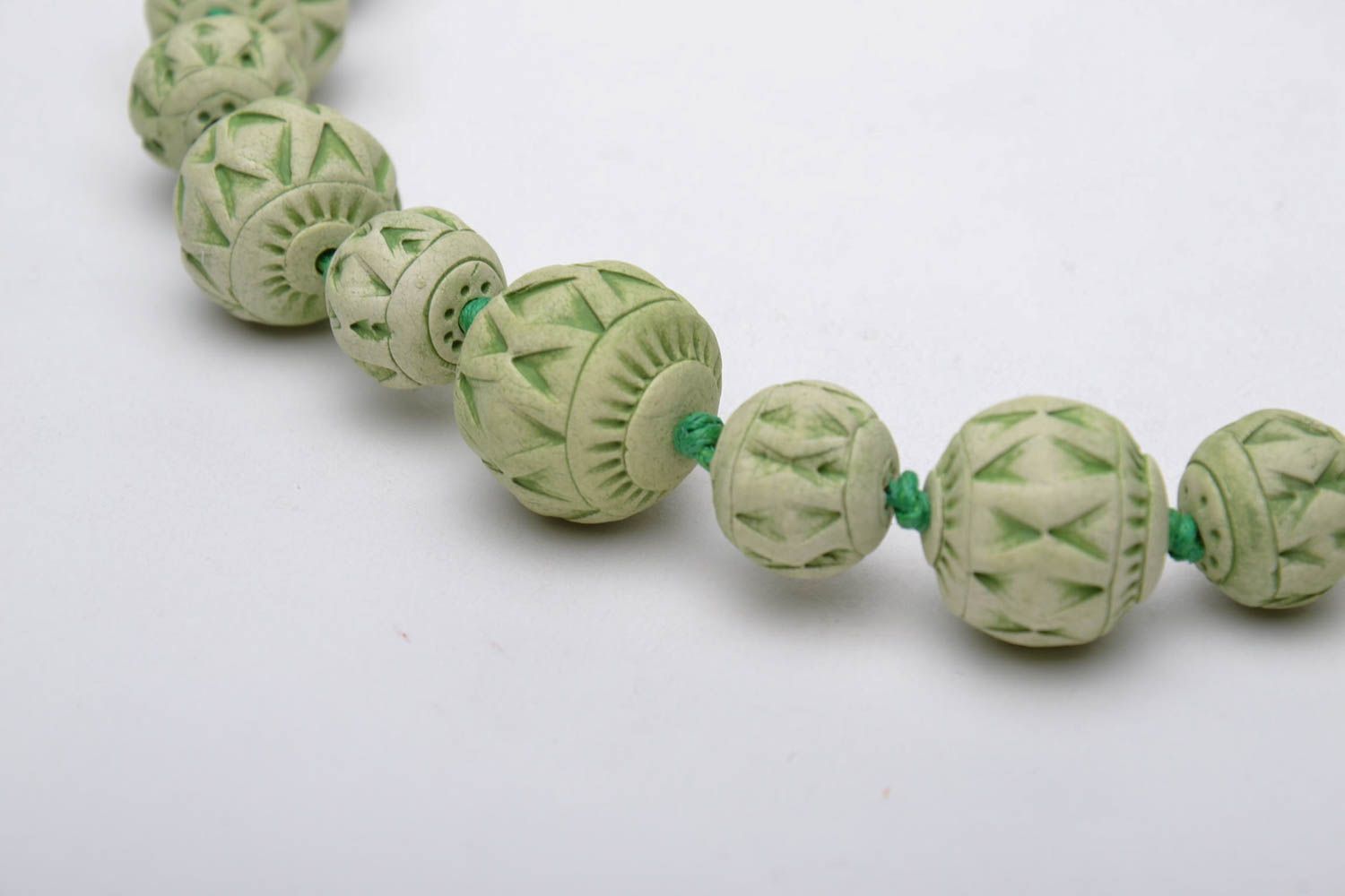 Clay bead necklace of green color photo 4