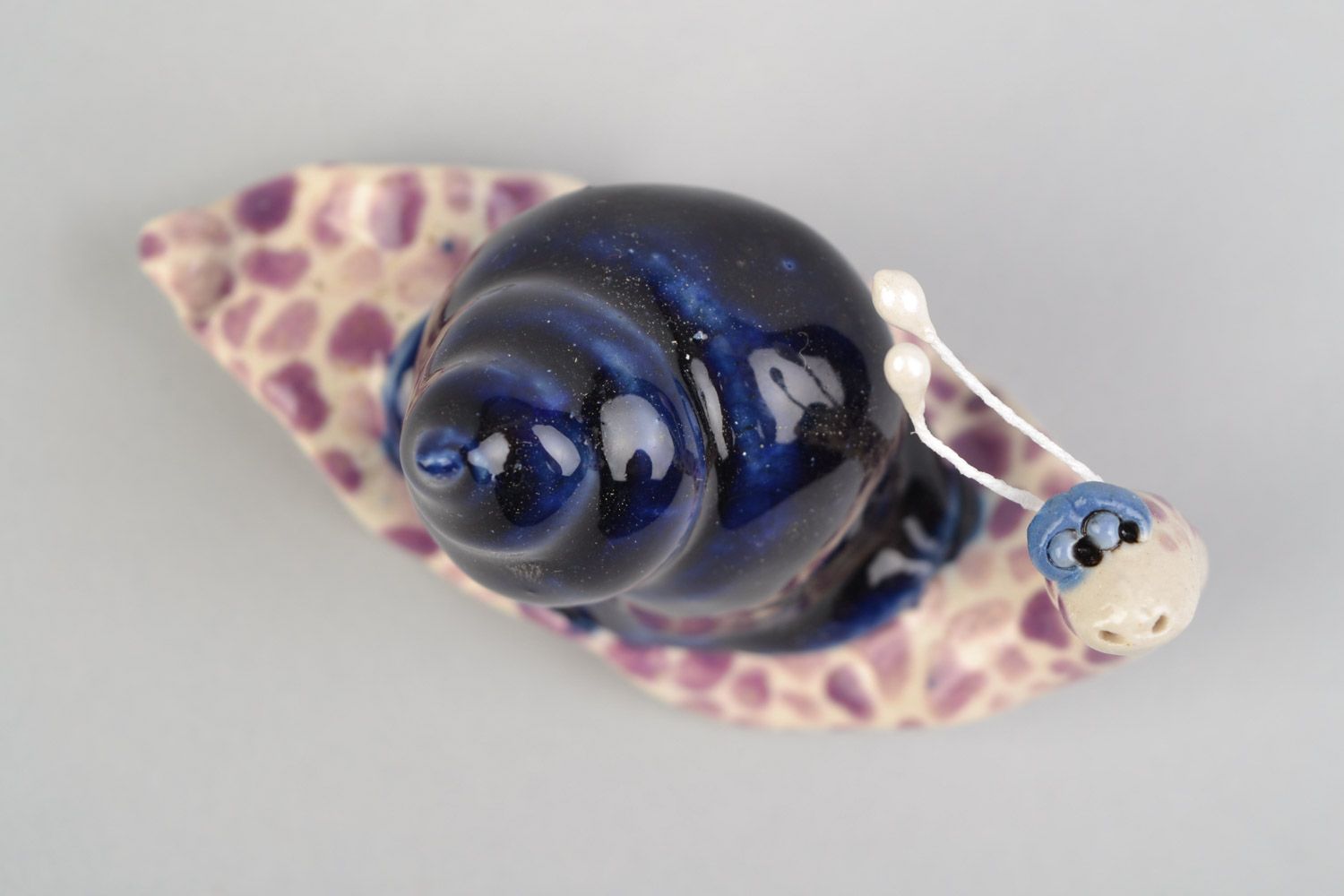 Handmade decorative ceramic snail figurine painted with colored glaze home decor photo 3