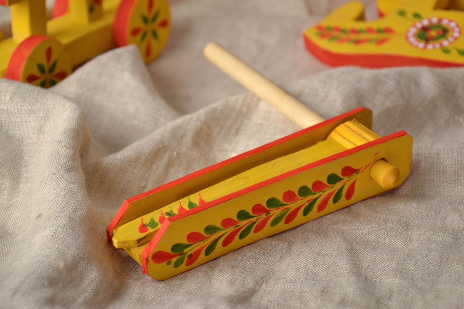 Homemade wooden toy in Ukrainian ethnic style photo 1