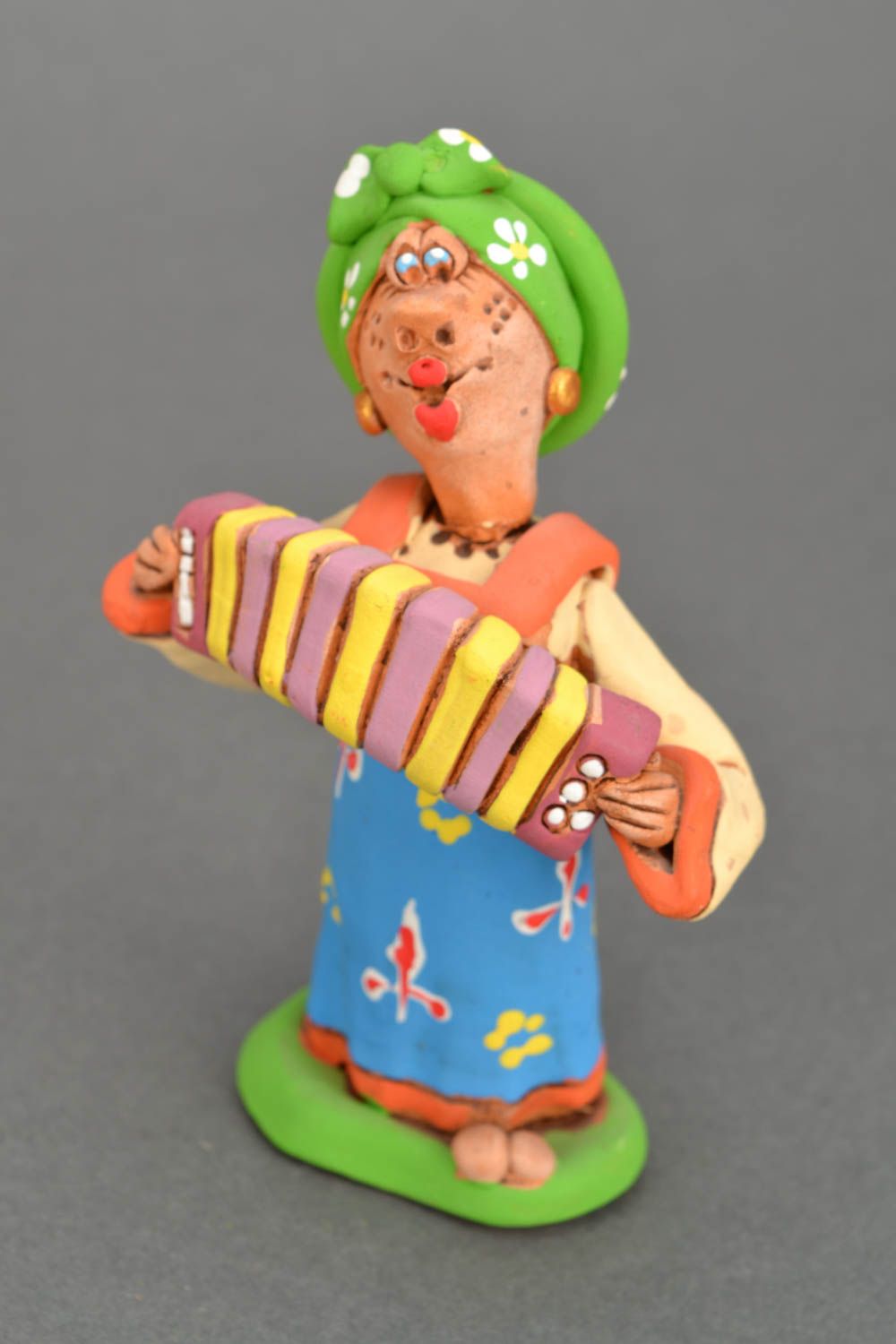 Bright clay figurine Cossack Woman Playing an Accordion photo 3