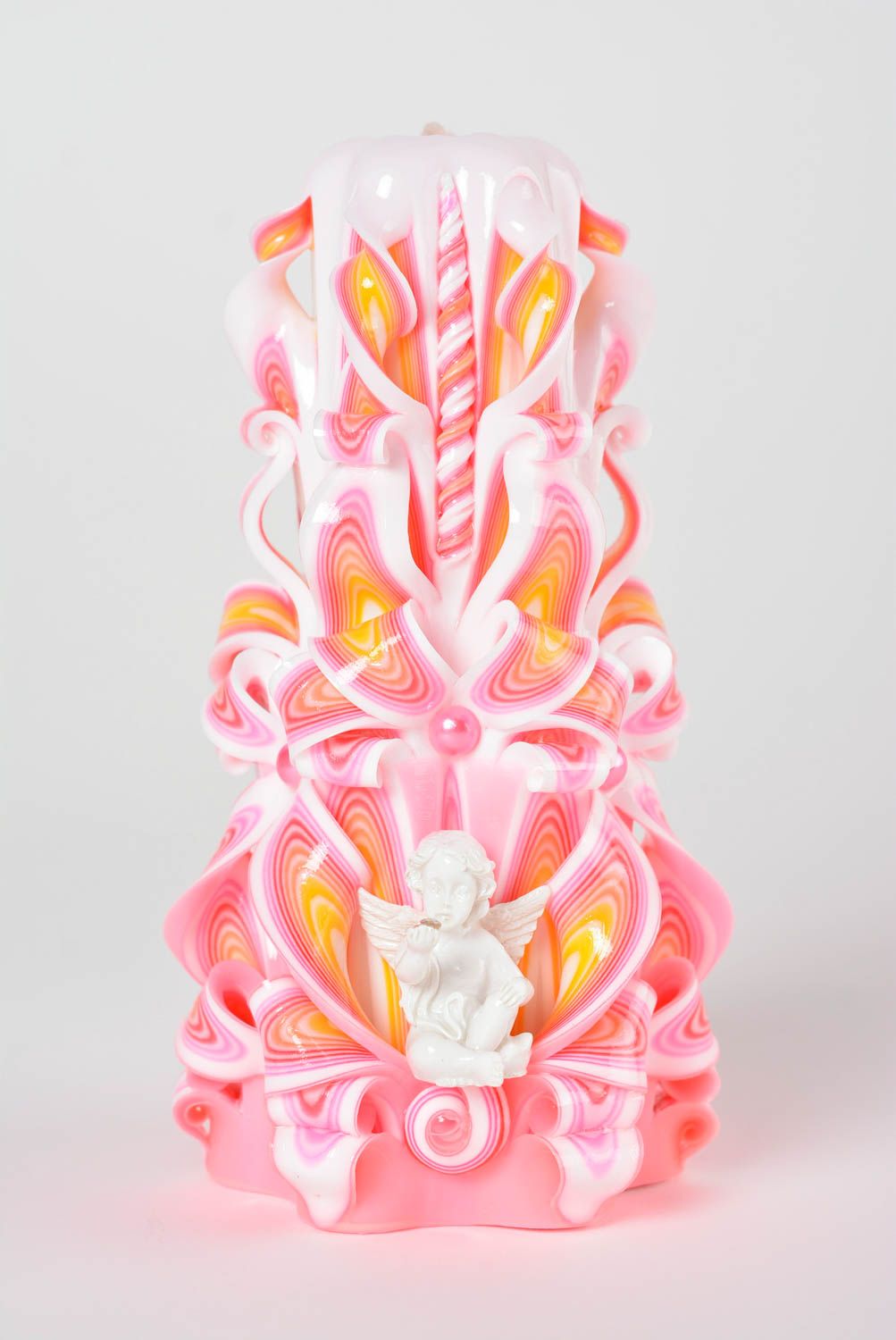 Свеча ручной работы красивая свеча розовая парафиновая свеча с ангелочком фото 2