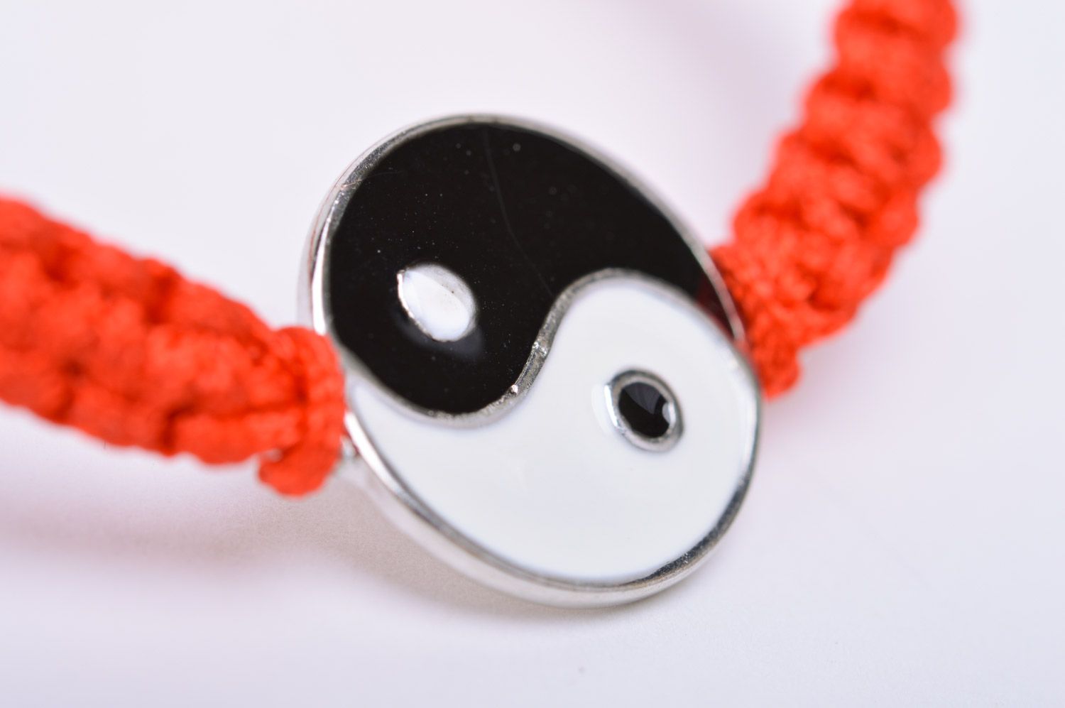 Handmade thin friendship bracelet woven of red threads with Yin and Yang sign photo 4