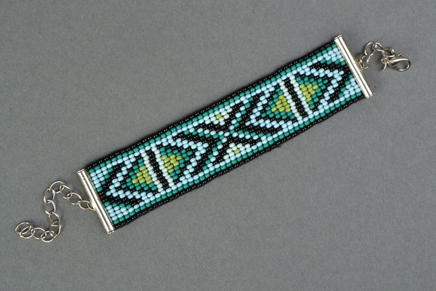 Ethnic black and light green ethnic beaded wide bracelet photo 1