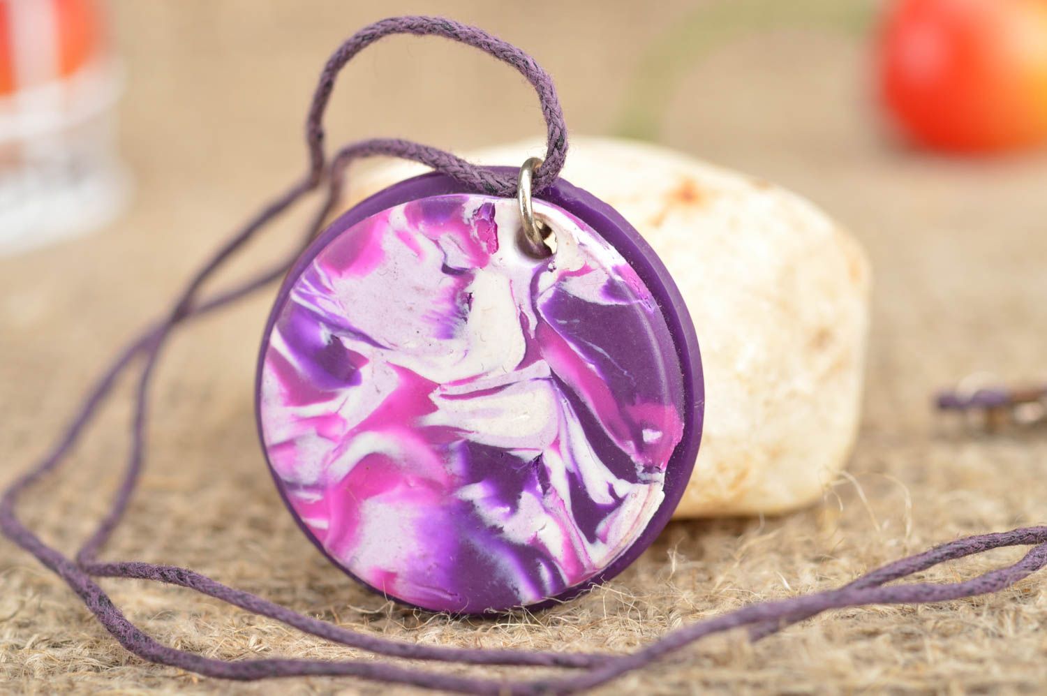Elegant handmade round purple pendant created using polymer clay on cord photo 1