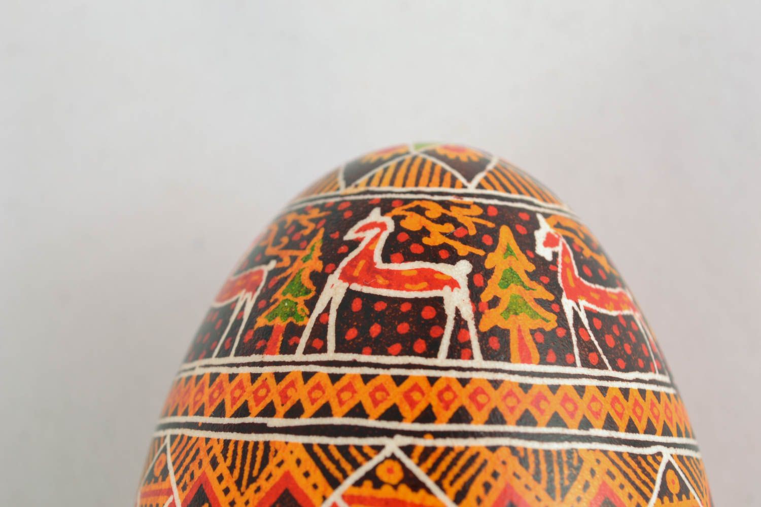 Painted goose egg in Ukrainian style photo 1