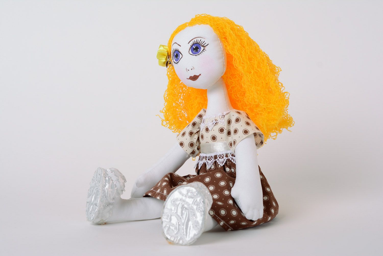 Handmade fabric soft doll of average size with yellow hair in dress photo 3
